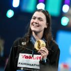 Dunedin swimmer Erika Fairweather celebrates winning gold at the World Aquatic Championships in...
