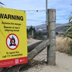 A council sign at the Allenby Pl entrance to Mount Iron Recreational Reserve warning of fire...