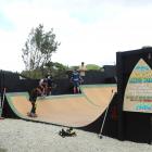 Young Hampden skateboarders test out their new halfpipe last weekend. PHOTO: NIC DUFF
