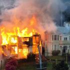 The former boarding house in Phillips St, was engulfed in flames. PHOTO: STEPHEN JAQUIERY