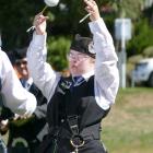 City of Dunedin Juvenile Pipe Band drummer Emily Franklin, 17, in action during her band’s...