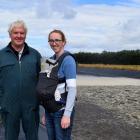 Dairy farmer Stewart Morrison, with his daughter Megan and sleeping grandson Oliver, 3 months, at...