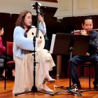 Performing during a Chinese New Year concert on Saturday are (from left) Yanan Qi (piano),...