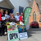 Keen to supply high-quality fruit and veges to the community at bargain prices are (from left)...