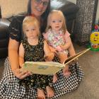Mosgiel mum Anna Williamson and her daughters Alessia (left) and Maisie settle in to enjoy one of...