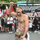 Matu Pene leads yesterday’s Toitū te Tiriti march in Dunedin. PHOTOS: GREGOR RICHARDSON