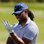 Former NFL star Larry Fitzgerald pauses between shots during the New Zealand Open at Millbrook....