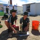 Terrace School pupils Blair Botha (left), 11, and Esther John, 11, enjoy the hands-on activities...
