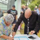 Signing over the Kaitangata pool to community ownership recently are (from left) Kaitangata Pool...