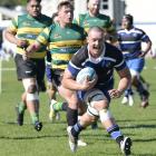Kaikorai flanker Hayden Michaels crosses for a try. PHOTO: ODT FILES