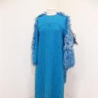 An evening dress and cape by New Zealand designer Beverly Horne from the Eden Hore collection is...
