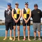 Standing on the podium following their bronze medal in the boys under-18 novice double sculls are...