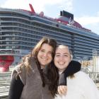 Passengers Abbey Lobsinger (left) and Jess Barker, of Brisbane, pose in front of Resilient Lady...