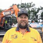 Digging it . . .Troy Calteaux won the national excavator operator competition for the fourth year...