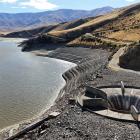 Water levels at Falls Dam are at their lowest since 1999 and farmers are voluntarily reducing...