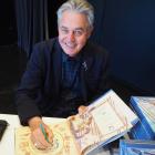 Children’s book author Gavin Bishop at a book signing. Photo: supplied