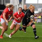 Lucy Jenkins charges towards the try line against Wales during their WXV test at Forsyth Barr...