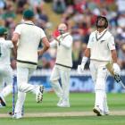 New Zealand's Rachin Ravindra leaves the field after being dismissed by Australia during day four...