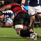 Laghlan McWhannell of the Blues charges forward against the Crusaders. Photo: Getty Images
