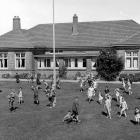 Children playing outside Glendining Presbyterian Children’s Home in1950. PHOTO: Evening Star