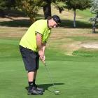 Island Park’s Mike Wray attempts to sink a putt during the Metropolitan senior A pennant series...