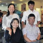 Momoka and Kazuma Kobori, with their parents Ryo (front right) and Junko, at the Rangiora Golf...