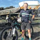 Kaiapoi cyclist Bruce Milsom in front of the benefactor of his fundraising marathon ride - The...