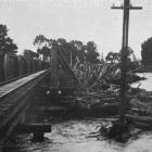 Driftwood piles up against the Whakatu railway bridge following flooding in the Hawke’s Bay...