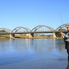 Angler Peter Rhodes, of Balclutha, fishes for salmon in the lower Clutha River near the Balcultha...