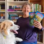 Queensberry writer Kate Gordon-Smith with collie Kenzie, 5, and copies of her second children's...