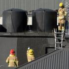 Fire and Emergency New Zealand crews respond to The Law Courts Hotel, in Stuart St, after a...