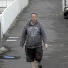 A CCTV image released by police yesterday shows missing man Jon, 44, walking in Castle St the day...
