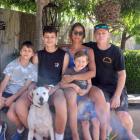 Flora Lira and partner Logan Ralston — seen here with their children (from left) Luca, 8, Enzo,...