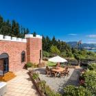 The property looked like a standard brick home from afar until the battlements were added in the...