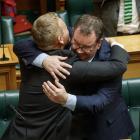 Grant Robertson hugs Labour leader and friend Chris Hipkins after his valedictory speech in...