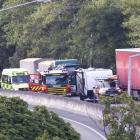 Emergency services at the scene of this morning's crash on Dunedin's Southern Motorway. Photo:...