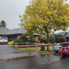 Police at the scene of a homicide investigation on Cranmer Close, Rototuna. Photo: NZ Herald