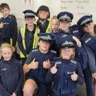 Year 6 pupils from the Te Manahuna Kāhui Ako make the most of a visit from Timaru Police....