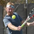 Ryan Eggers plays a return on his way to winning the men’s singles at the Otago Open on Sunday....