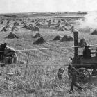 A steam traction engine is used to thresh stooked wheat on a Southland farm. — Otago Witness, 1.4...