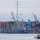 Wreckage of the Francis Scott Key&nbsp;Bridge&nbsp;lies across the deck of the cargo vessel Dali...