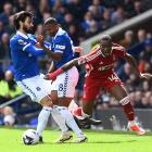 Everton's Andre Gomes and Ashley Young in action with Nottingham Forest's Callum Hudson-Odoi....