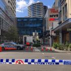 A police car is parked outside Westfield Bondi Junction Mall following Saturday’s stabbings in...