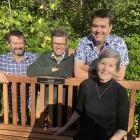 Jim’s widow Irene, watched over by sons, from left, Shaun, Grant and Craig, was first to sit on a...