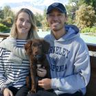 Newly-retired tennis pro Ben McLachlan with his wife Georgia and their new puppy, Milo. PHOTO:...
