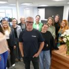 Destination Queenstown boss Mat Woods pictured in the RTO’s new home with some of his staff,...