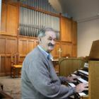 Baring Square Methodist Church parish steward Alister Smyth with the church’s new organ. Photo:...