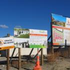 Signs advertise plots for sale in Dunstan Park amid low demand for houses in the subdivision...