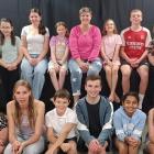 Preparing for their moment in the spotlight are performers in the Alexandra Musical Society...