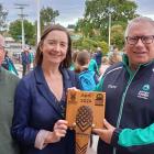Commemorative gift . . . Holding the patu which was presented to Matthew Flinders Anglican...